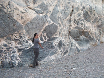Lucy Chang poses by an impressive breccia