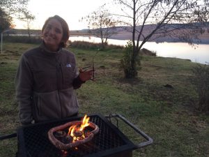 Marianne practices the art of braai, South African barbeque. Photo by Tesla Monson