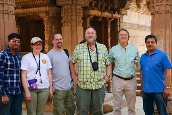 Researchers Tushar Mittal, Courtney Sprain, Loÿc Vanderkluyson, Paul Renne, me (Mark Richards), and Kanchan Pande visiting a step well near our field site in Ahmedabad, Gujarat State, India. The carved stones behind us are not Deccan basalts, but they are very impressive!