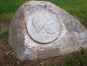 Eddy grave marker with plaque