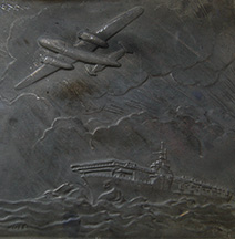 Bas-relief to the right of Doolittle's on the plaque