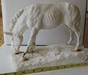 Browsing horse sculpture
