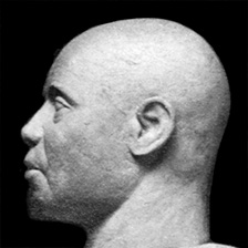 Sculpture of bald-headed man
