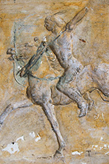 Mold of Native American on horseback
