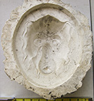 Mold for a large version of the small mask at left