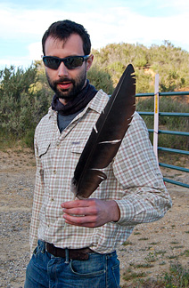 Jeff holds a condor feather