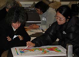 teachers studying maps