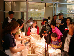 Volunteers prepare the femur