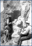 Merriam and Miller excavating an entelodont skull, 1899