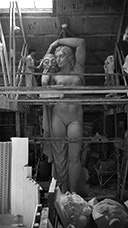 Huff applies final touches to the scaled-up Arts figure