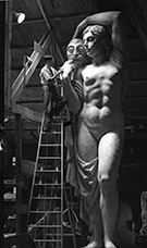 Huff applies final touches to the scaled-up Arts figure